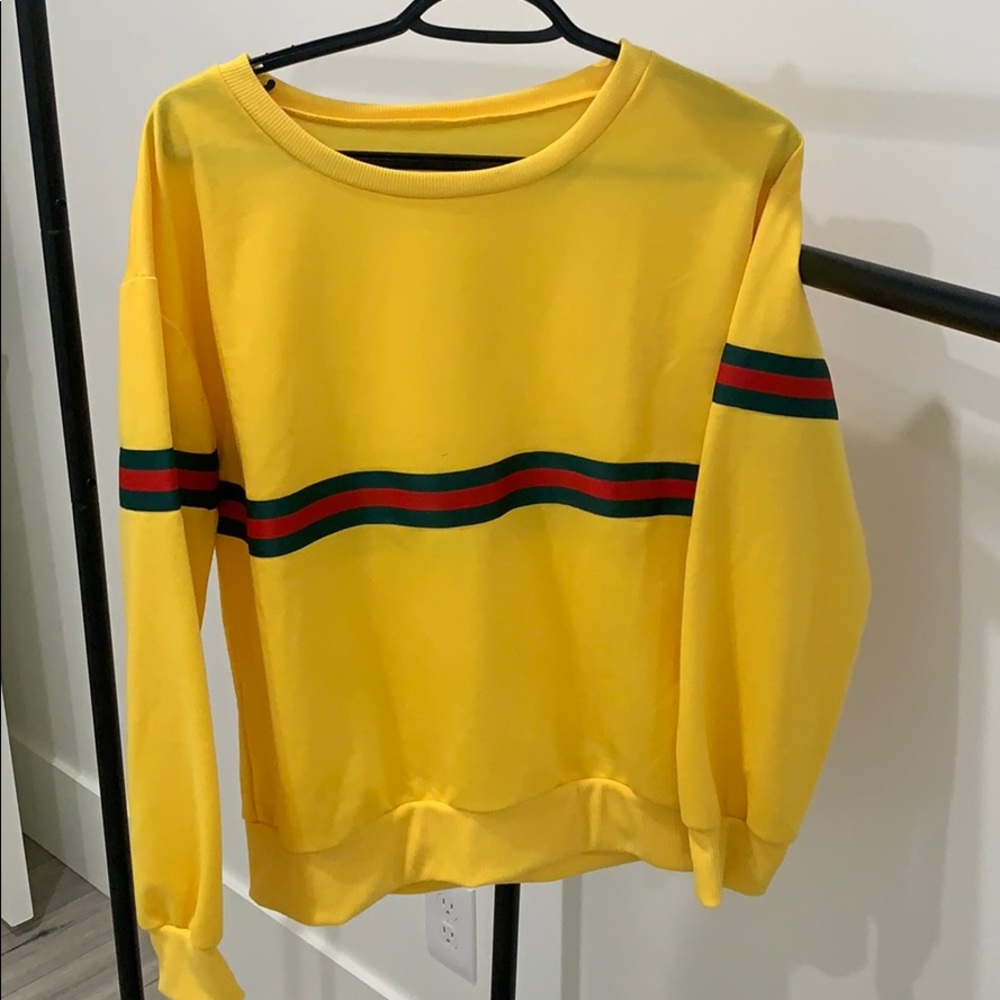 yellow sweatshirt